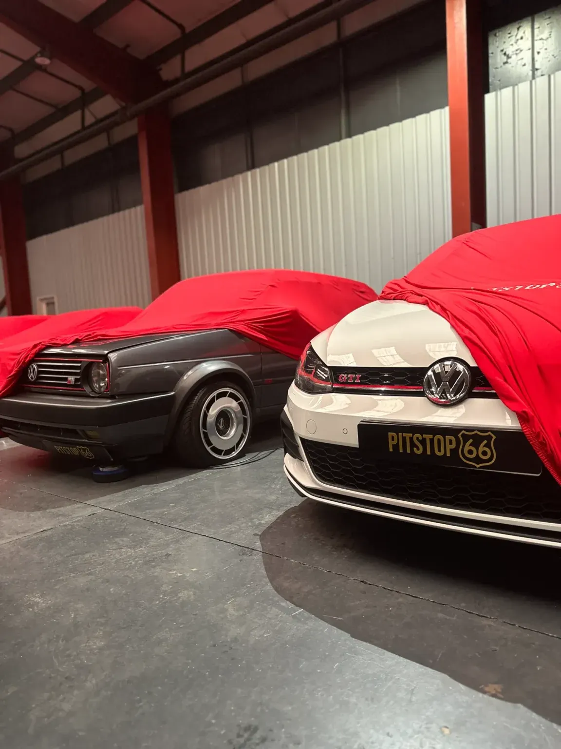 Classic supercars covers with protective cover in car storage