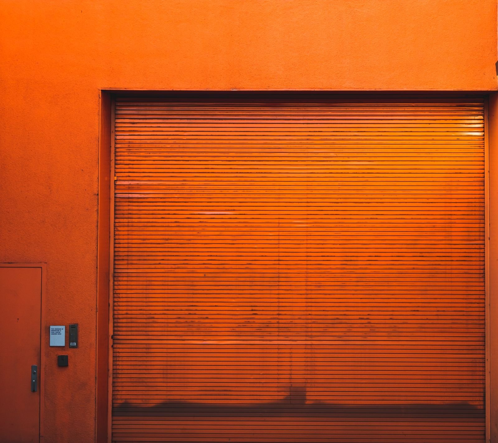 Closed roller door on a drive-up self-storage unit, the kind rented as a car storage unit