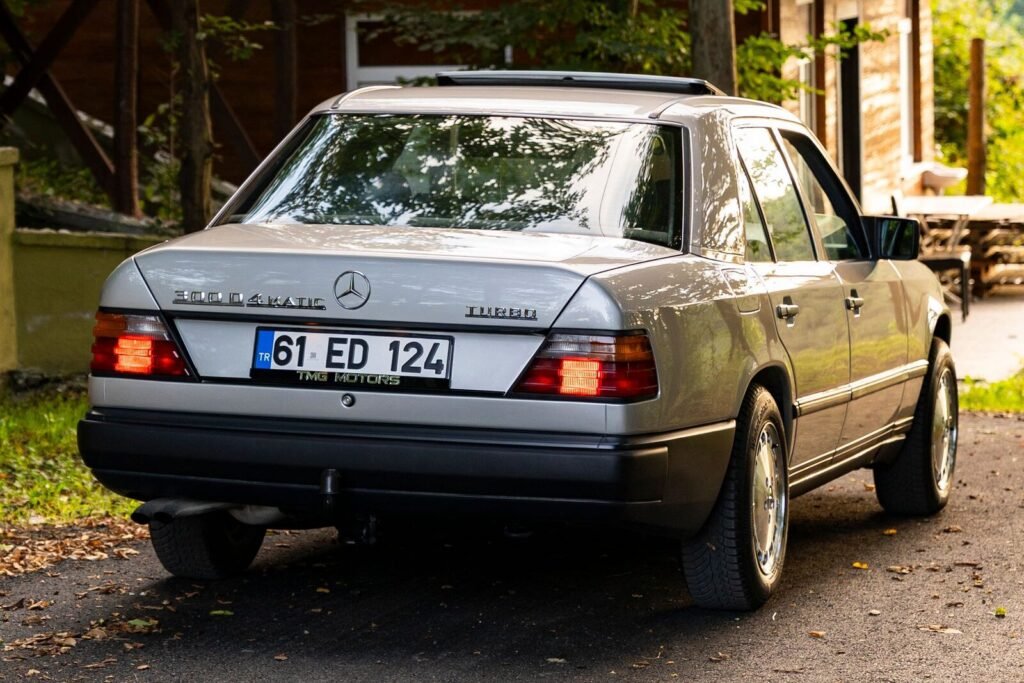 Classic Mercedes saloon parked on a private driveway, off the public road