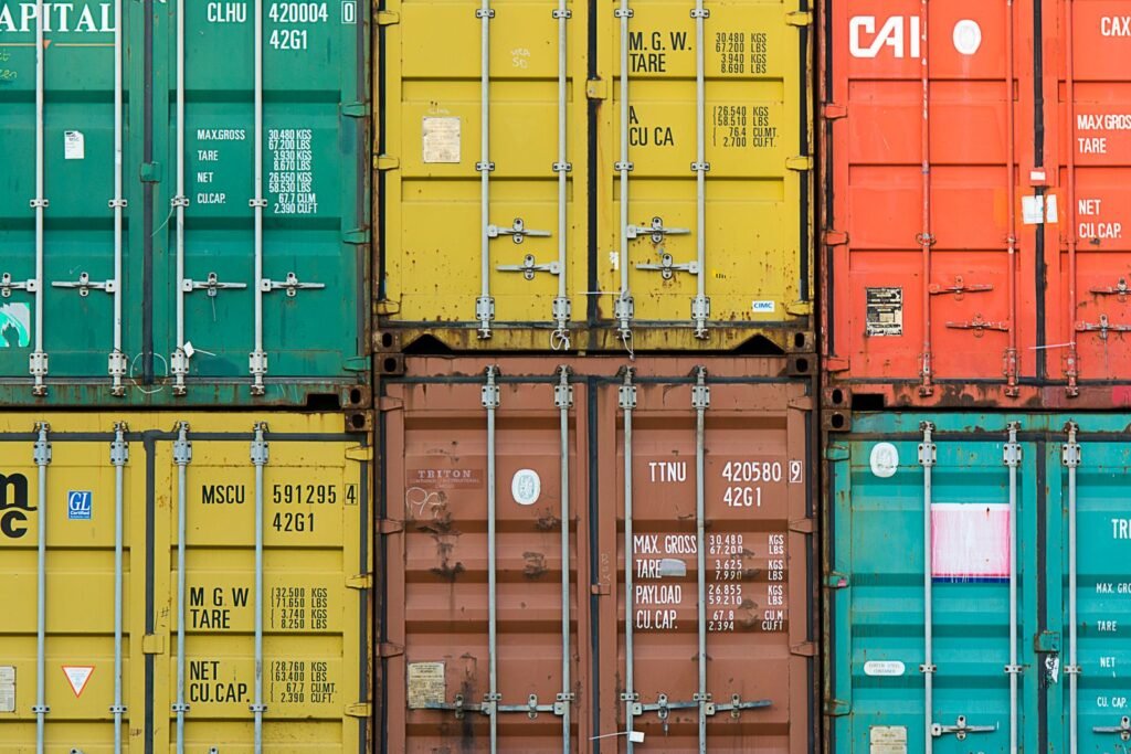 Stacked steel shipping containers, often rented as outdoor car storage units